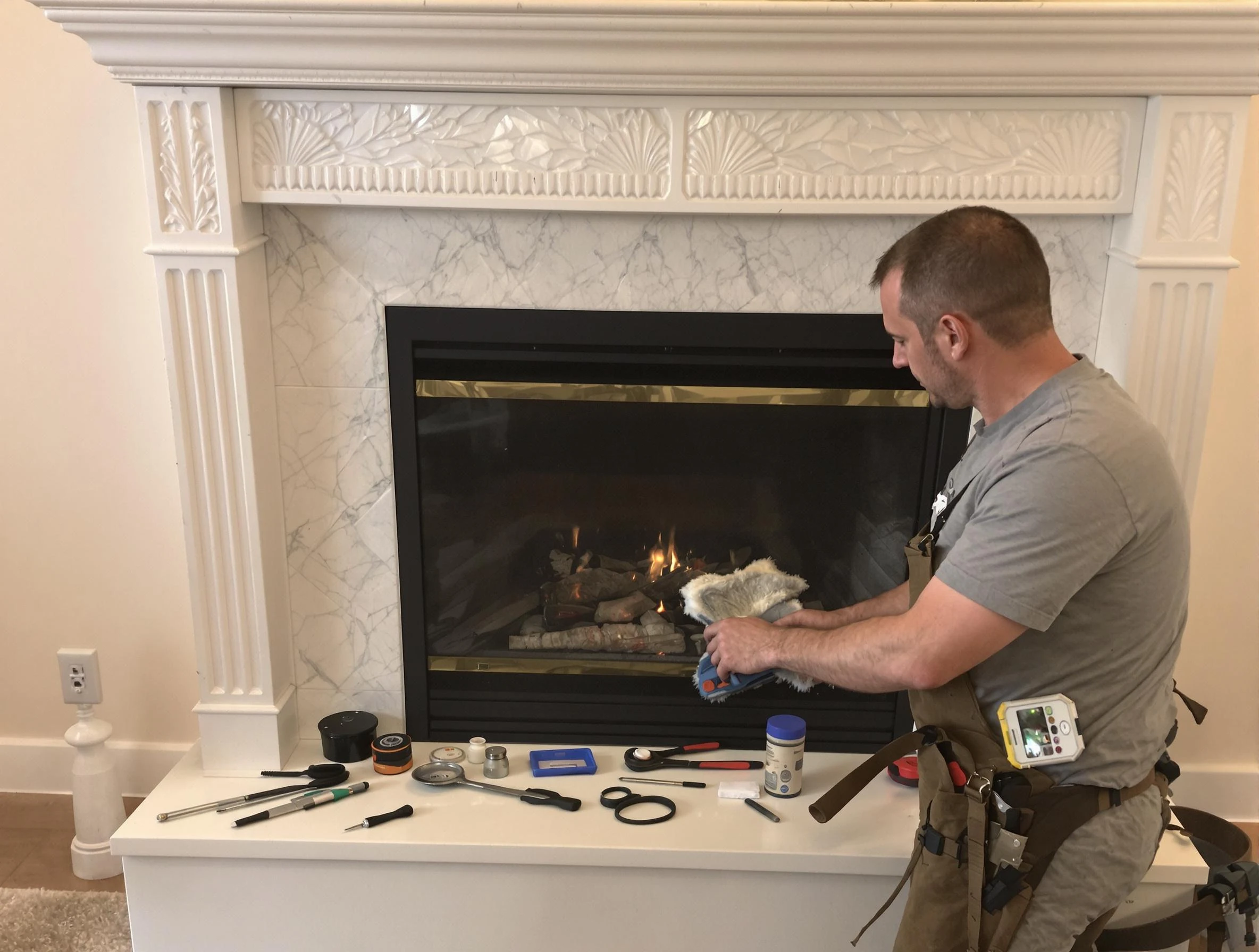 Newnan Chimney Sweep performing fireplace maintenance in Newnan, GA